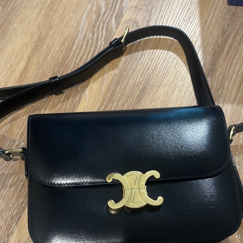 Chic Black Leather Crossbody Bag with Gold Accent